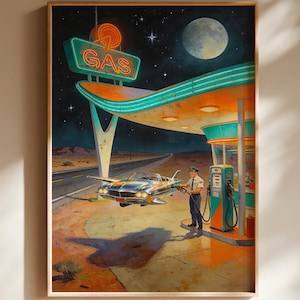 May include: A framed wall art print depicting a retro-futuristic gas station at night. A silver flying car hovers near a fuel pump while an attendant stands by. The scene features a neon GAS sign, a full moon, and a desert landscape under a starry sky.