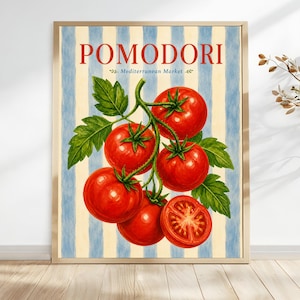 May include: A framed print featuring a cluster of ripe red tomatoes with green leaves against a blue and cream striped background. The word "POMODORI" is at the top, with "Mediterranean Market" below.