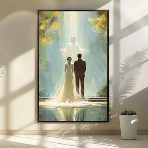May include: A framed art print depicting a wedding scene. A couple stands before a radiant figure in a bright light. The bride wears a white gown and veil, and the groom is in a dark suit. The background features a soft, ethereal landscape.