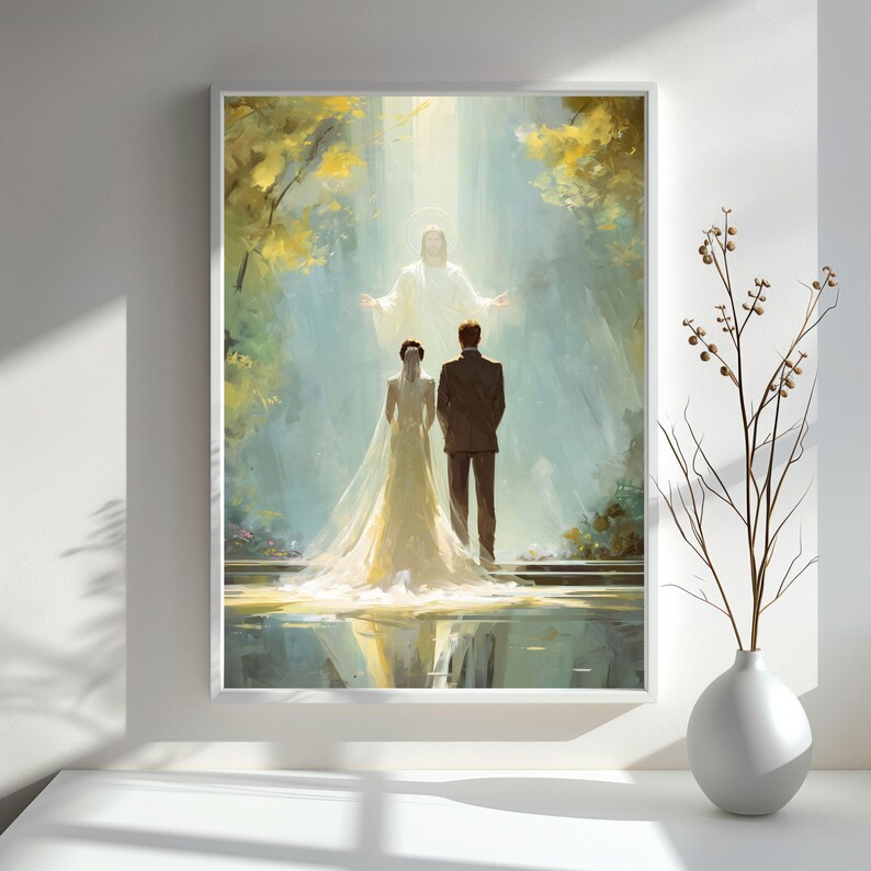 May include: A framed art print depicting a wedding scene. A couple stands before a figure in a bright light, surrounded by a serene landscape. The bride wears a white gown and veil, and the groom is in a dark suit.