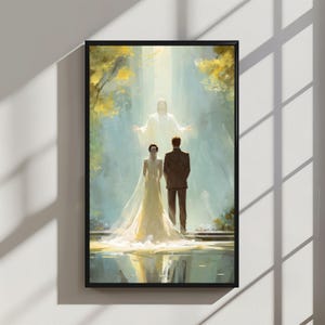 May include: A framed art print depicting a wedding scene. A bride in a white gown and a groom in a suit stand before a figure in white light. The background features a soft, ethereal landscape with yellow foliage and a bright light.