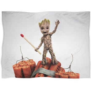 May include: A digitally rendered image of a Groot-like character standing on a bundle of dynamite. The character is holding a match with a red head. The dynamite is wrapped in gray tape and has a red-orange color.