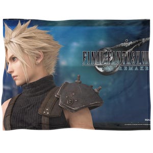 May include: A blanket featuring a character from Final Fantasy VII Remake. The design includes a blonde-haired character in a black turtleneck and armor, with the game's logo on a blue background.