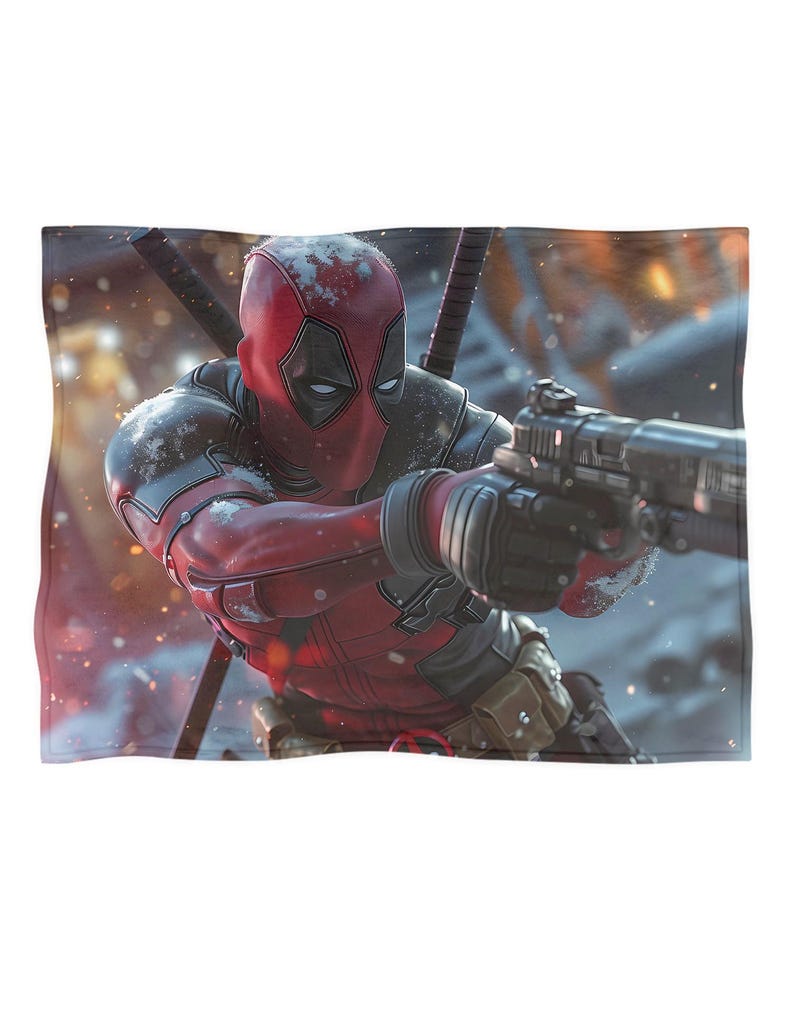 May include: A red and black Deadpool graphic blanket. The image shows Deadpool in his costume, holding a gun and looking to the right. The background is a snowy, action-packed scene.