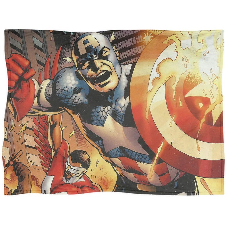 Peut inclure: Une couverture illustr&eacute;e de style bande dessin&eacute;e repr&eacute;sentant Captain America en action, tenant son bouclier. Le design pr&eacute;sente des couleurs vives, avec Captain America dans son costume bleu, blanc et rouge embl&eacute;matique. L'arri&egrave;re-plan repr&eacute;sente une sc&egrave;ne de ville.