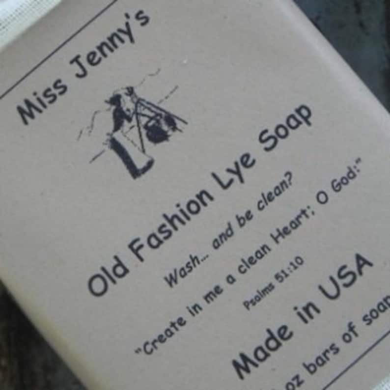 May include: A bar of brown lye soap with the text "Miss Jenny's Old Fashion Lye Soap" and the quote "Create in me a clean Heart: O God:" Psalms 51:10. The soap is made in the USA.