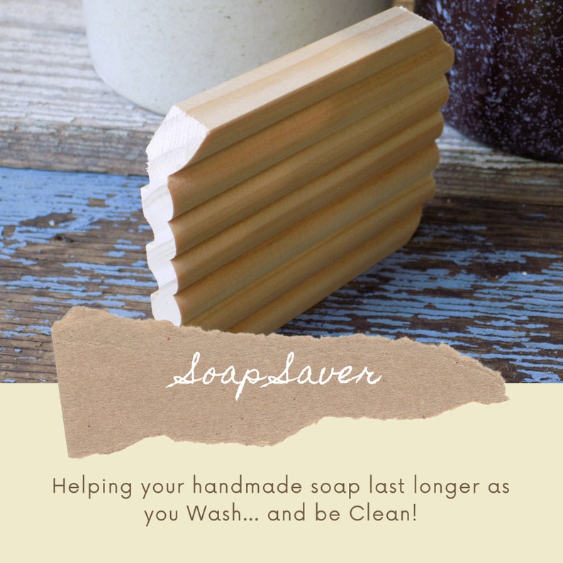 May include: A wooden soap saver with ridges to help handmade soap last longer. The soap saver is on a blue and white painted wooden surface. "Soap Saver" is written on a brown paper tag.