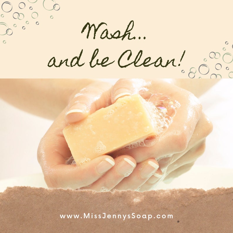 May include: A person's hands are washing with a bar of soap. The soap is light yellow and is being held in the palms of the hands. The background is a light peach color with white bubbles. The text "Wash... and be Clean!" is written in dark green cursive at the top of the image. The text "www.MissJennysSoap.com" is written in black at the bottom of the image.