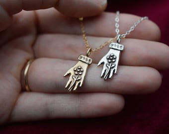 Hand Holding Flower Necklace - Sterling Silver or Bronze Charm