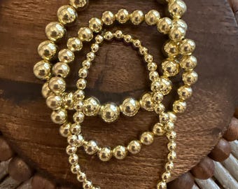 Gold stack beaded bracelets