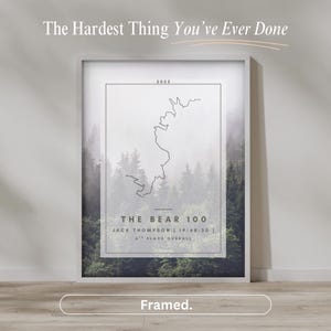 May include: Framed print with the text "The Hardest Thing You've Ever Done." The print features a black line map, the text "THE BEAR 100," and the name "JACK THOMPSON" with a time and place. The word "Framed" is at the bottom.