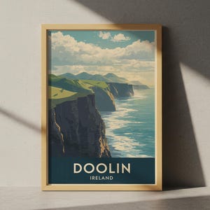 May include: A framed art print featuring a scenic view of the Doolin cliffs in Ireland. The artwork showcases the cliffs, ocean, and sky in shades of blue, green, and beige. The print includes the text "DOOLIN IRELAND" in white letters on a dark blue background.