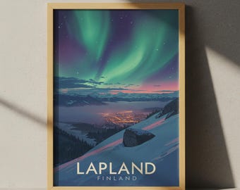 May include: A framed print featuring a vibrant depiction of the Northern Lights over Lapland, Finland. The artwork showcases a snowy mountain slope, a city's lights, and a colorful sky with green and purple hues. The text "LAPLAND FINLAND" is displayed at the bottom.