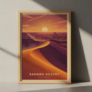 Peut inclure: Impression d'art encadrée représentant le désert du Sahara au coucher du soleil. L'image présente une palette de couleurs orange et violette vibrante, avec le soleil se couchant sur des dunes de sable ondulantes. Le texte "SAHARA DESERT NORTH AFRICA" est affiché en bas.