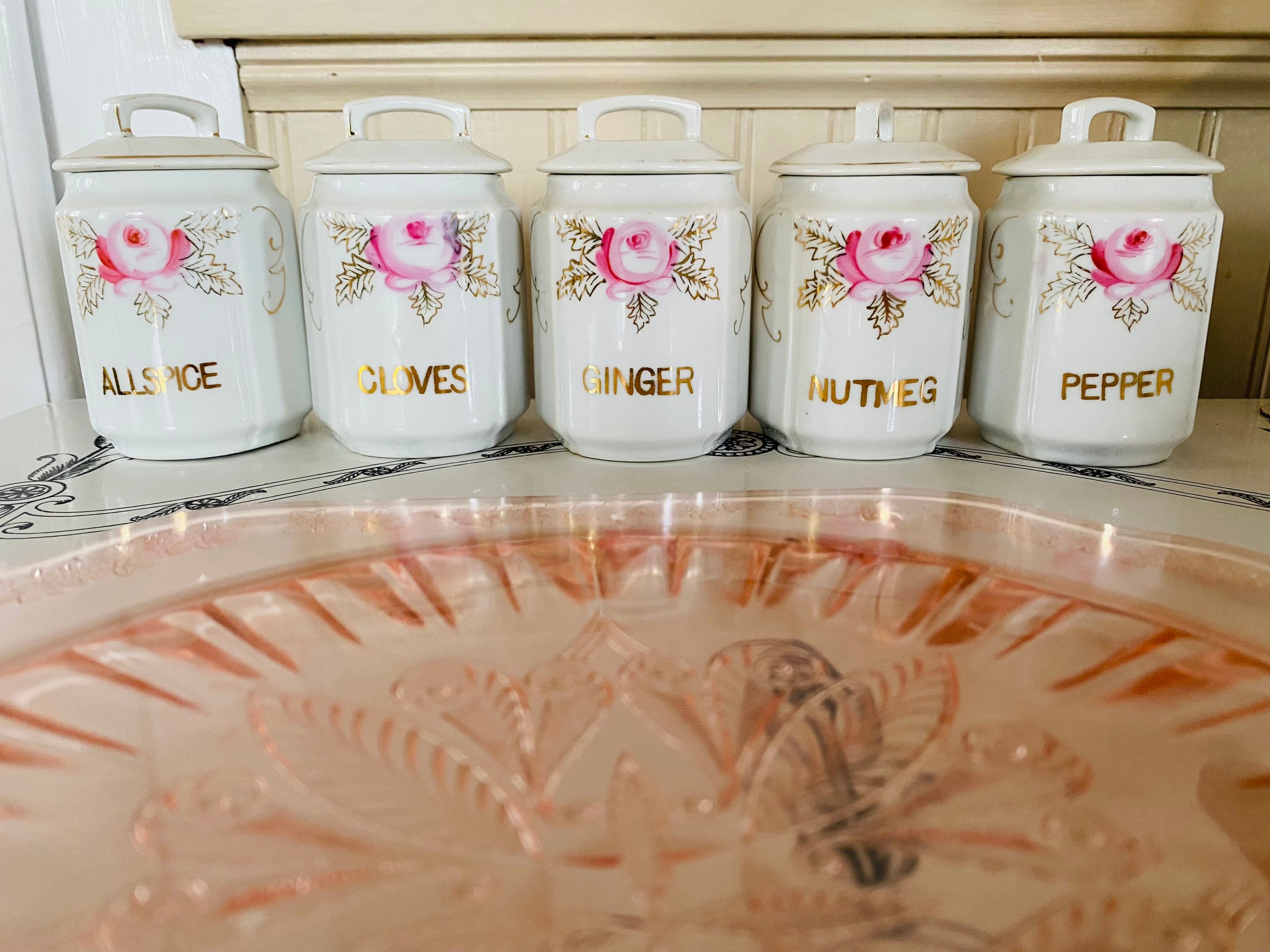 Vintage spice rack and pink jars