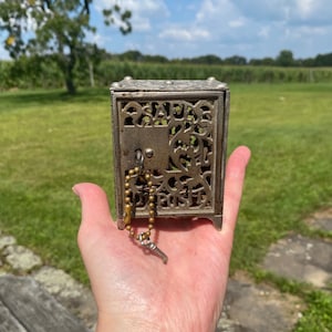 Antique safe deposit coin bank, metal penny bank, safe coin bank with two keys, antique toy bank