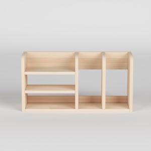 May include: A light-colored wooden desk organizer with three shelves and two vertical dividers. The organizer has a rectangular shape and is made of unfinished wood. The shelves are evenly spaced, providing storage for office supplies or small items.