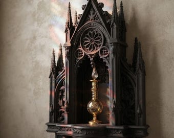 May include: A dark, ornate wall-mounted shelf featuring intricate gothic architectural details, including pointed arches and a circular rose window design. A small, clear glass perfume bottle with a gold base sits centered on the shelf platform.
