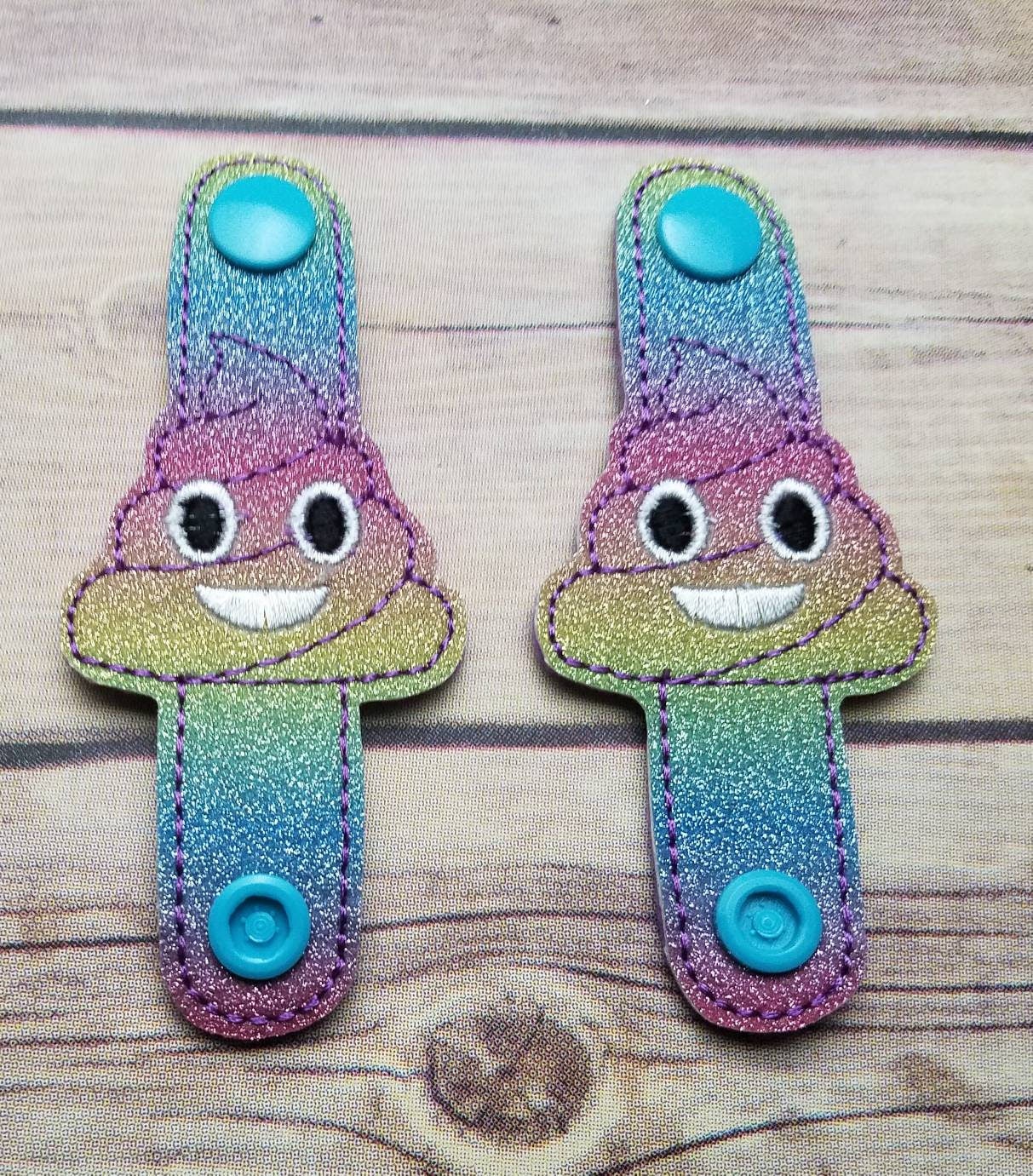 Rainbow glitter poop emoji cord keeper Etsy