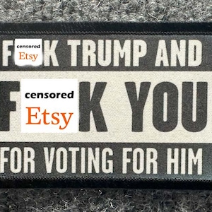 May include: A rectangular black and white embroidered patch featuring bold, capitalized text. The patch displays the message F-K TRUMP AND F-K YOU FOR VOTING FOR HIM, with the word censored covering parts of the text in two locations.