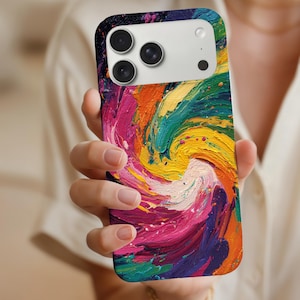 May include: A colorful phone case with a vibrant abstract art design. The case features a swirling pattern of bright colors including pink, yellow, green, orange, and purple. The phone case has a black border and a camera cutout.