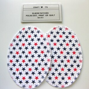 May include: Two white oval elbow patches with a red and navy blue star pattern. The patches are labeled "CRAFT ♥ T'S ELBOW PATCHES POLKA DOT, PRINT OR QUILT Set of 2".