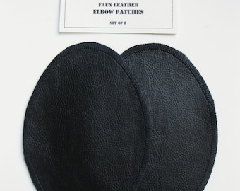 May include: Two black faux leather elbow patches, set of 2.  CRAFT ♥ T'S Faux Leather Elbow Patches Set of 2.
