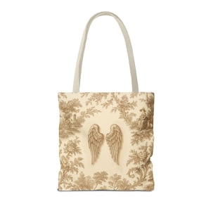 Vintage toile tote bag with angel wings and beige botanical print, rustic French country tote in vintage cottagecore style.