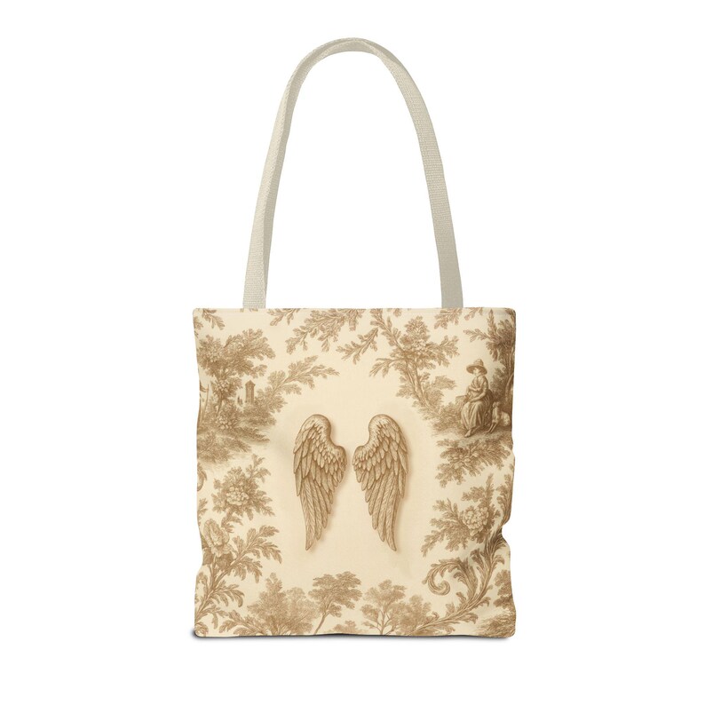 Vintage toile tote bag with angel wings and beige botanical print, rustic French country tote in vintage cottagecore style.
