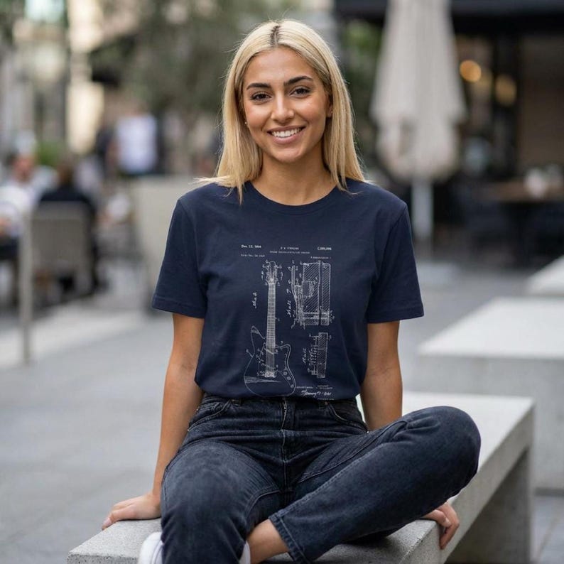 T-shirt with a vintage guitar blueprint patent drawing in a Fender-style diagram.