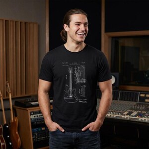 T-shirt with a vintage guitar blueprint patent drawing in a Fender-style diagram.