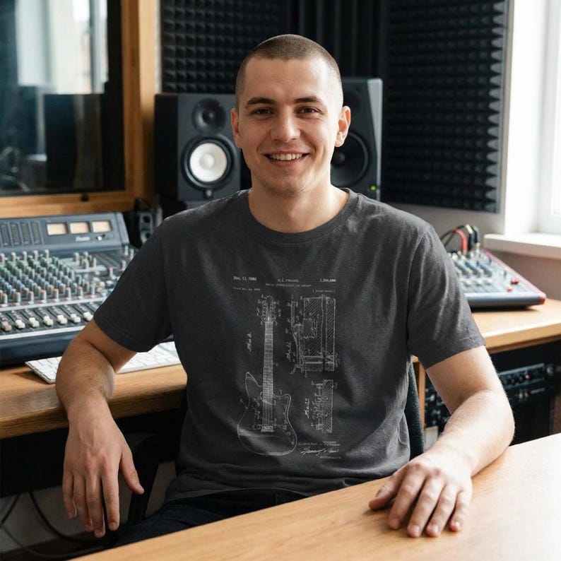 T-shirt with a vintage guitar blueprint patent drawing in a Fender-style diagram.