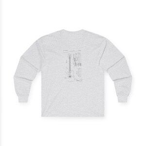 Unisex vintage guitar patent long sleeve tee with electric guitar blueprint in Fender-style patent art.
