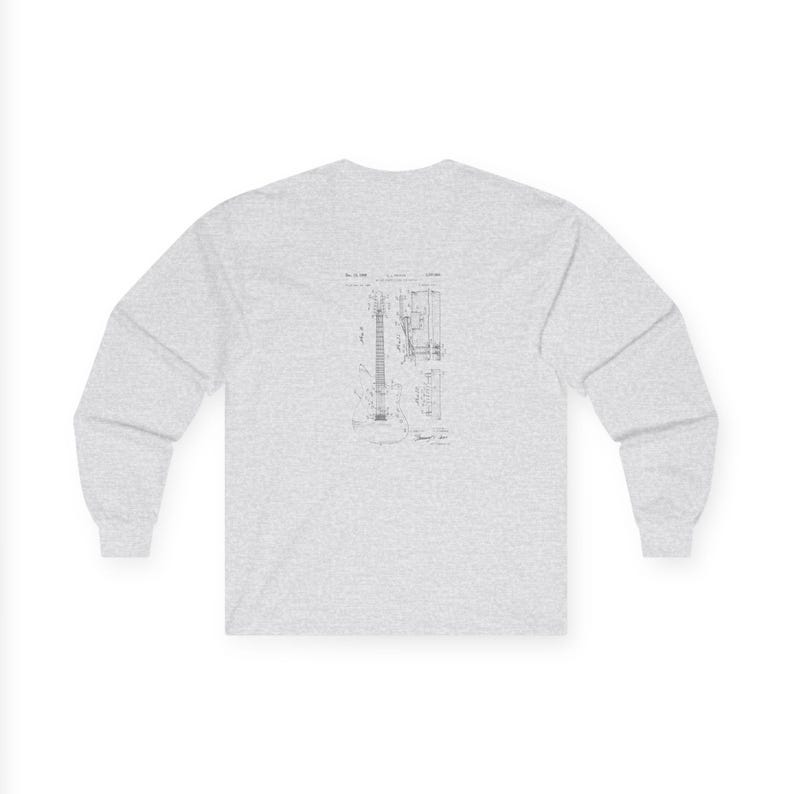 Unisex vintage guitar patent long sleeve tee with electric guitar blueprint in Fender-style patent art.