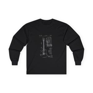 Unisex vintage guitar patent long sleeve tee with electric guitar blueprint in Fender-style patent art.
