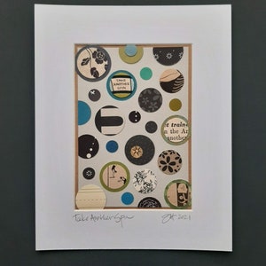 May include: Framed artwork featuring a collage of circular paper cutouts in various sizes and patterns. The circles include floral designs, stripes, and text, with a color palette of black, white, teal, and olive green. The text "Take Another Spin" is written at the bottom.