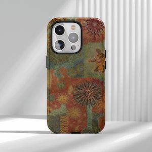 May include: A colorful phone case with a collage design. The case features a mix of warm colors, including red, orange, and green. The design includes suns, figures, and floral elements, creating a vintage, artistic aesthetic.