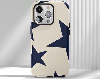 May include: A phone case with a cream-colored background and a pattern of navy blue stars. The case has a black border around the camera and sides. The phone case is designed to fit a smartphone.