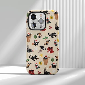 May include: A beige smartphone case featuring a repeating pattern of black cats, some wearing red Santa hats or scarves, interspersed with red coffee mugs, green ornaments, yellow gift boxes, red bows, holly leaves, and white snowflakes.