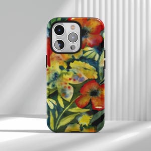 May include: A floral phone case featuring a watercolor design. The case showcases a vibrant arrangement of red, yellow, and green flowers against a dark background. The case has a glossy finish and a black border.