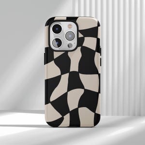 May include: A black and beige wavy checkerboard pattern phone case. The case has a black border and a camera cutout. The design is a modern take on a classic checkerboard, with the squares appearing to be melting.