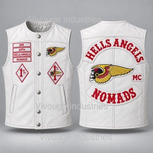 May include: A white leather waistcoat featuring red embroidered patches including the text 666, AFFA, HELLS ANGELS, NOMADS, and 1%. The back displays a large winged skull emblem with the text HELLS ANGELS MC NOMADS in red lettering on a white background.