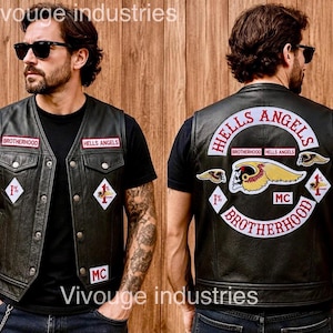 May include: A black leather vest featuring Hells Angels patches on the front and back. The front displays Brotherhood and Hells Angels text with 1% and MC patches. The back features a large Hells Angels Brotherhood logo with a winged skull graphic.