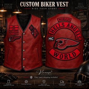 May include: A red leather biker vest featuring black trim and metal snap buttons. The front displays patches with text including 666, AFFA, and Hells Angels. The back features large embroidered patches reading Nomads, Hells Angels, and World.