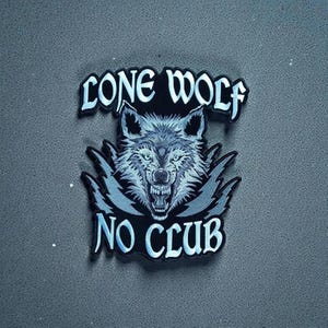 May include: A black patch featuring a detailed, snarling wolf's head in shades of blue and gray. The words "LONE WOLF" and "NO CLUB" are arched above and below the wolf image in a stylized font. The patch has a textured appearance.