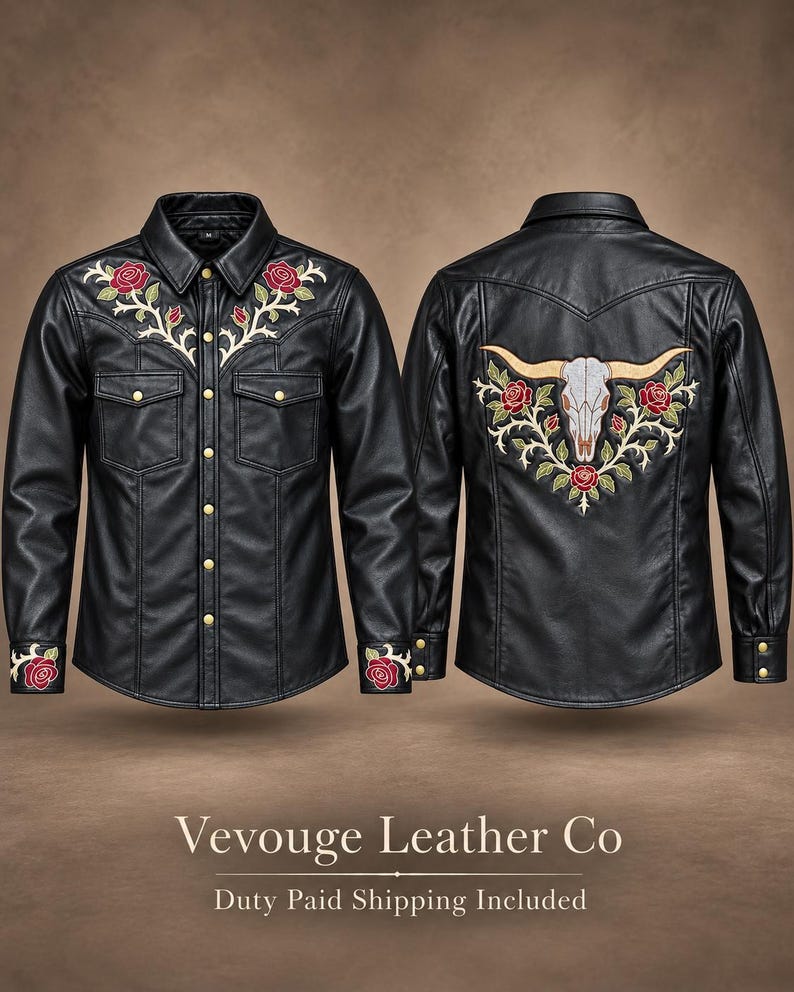 May include: A black long-sleeved shirt with a collar, gold-tone snap buttons, and two chest pockets. The front features red rose embroidery on the shoulders and cuffs. The back displays a large embroidered steer skull with red roses.