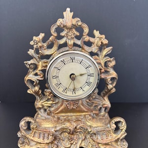 May include: A set of three ceramic vases in varying heights. The vases are white with a textured, ridged design. The tallest vase is approximately 10 inches tall, the medium vase is 8 inches, and the smallest is 6 inches.