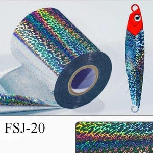 May include: A roll of holographic film featuring a repeating circular pattern with a rainbow sheen, displayed alongside a fishing lure with a red head and a matching holographic body. The text FSJ-20 is visible, along with a sample of the pattern.