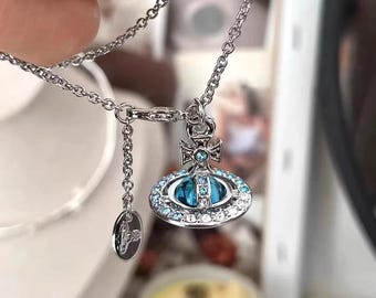 アクセサリー  orb cross necklace Saturn Orb Cross Silver Tiny Orb Blue Crystal Vintage NANA