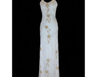 Elegant White hand Beaded Spaghetti Strap gown stretch, fabric stunning